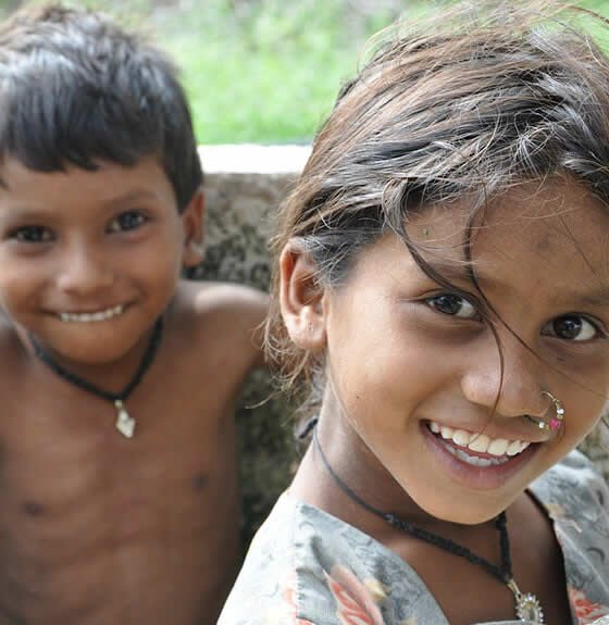 Two children smiling